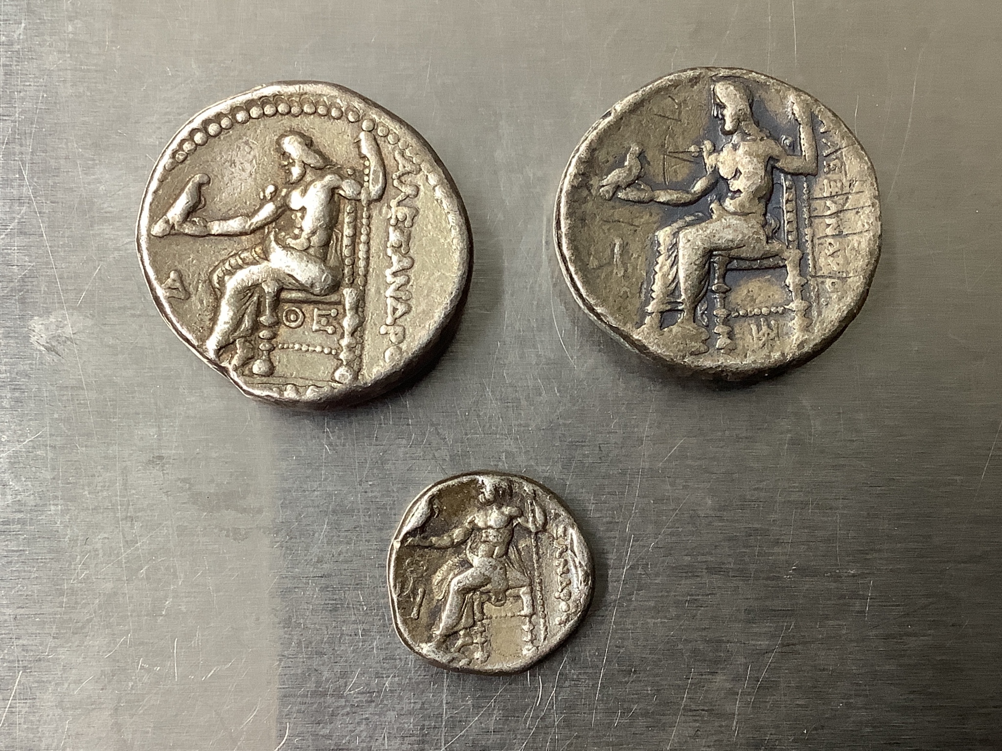 Two AR Tetradrachms, 17.2g, 23mm and 17.3g, 23mm and an AR drachm, 4.1g, 0.6mm, all with Head of Herakles right, wearing lion skin headdress / Zeus Aëtophoros seated left, holding sceptre; A?E?AN?POY to right